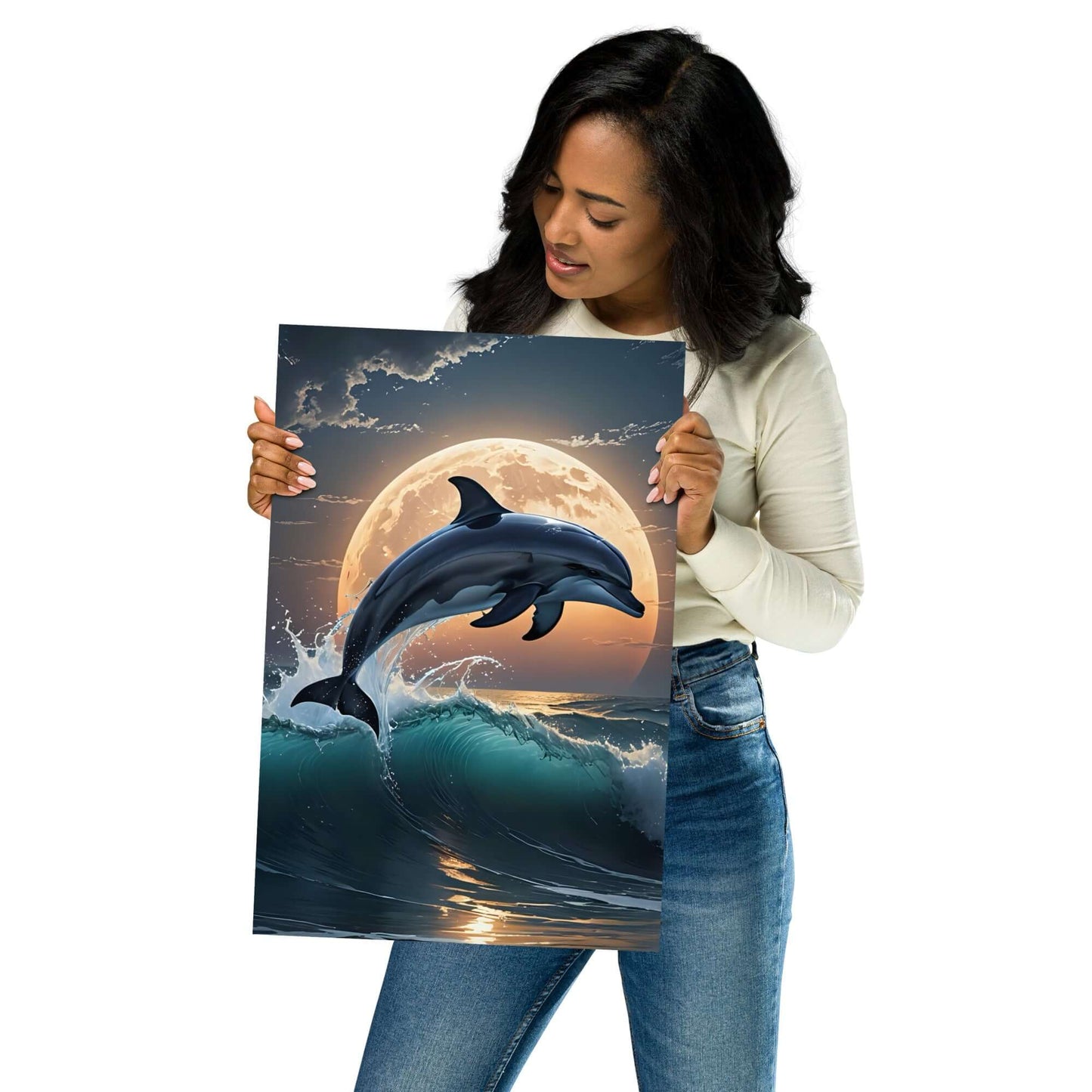 Woman holding a poster of dolphins and a moon over water