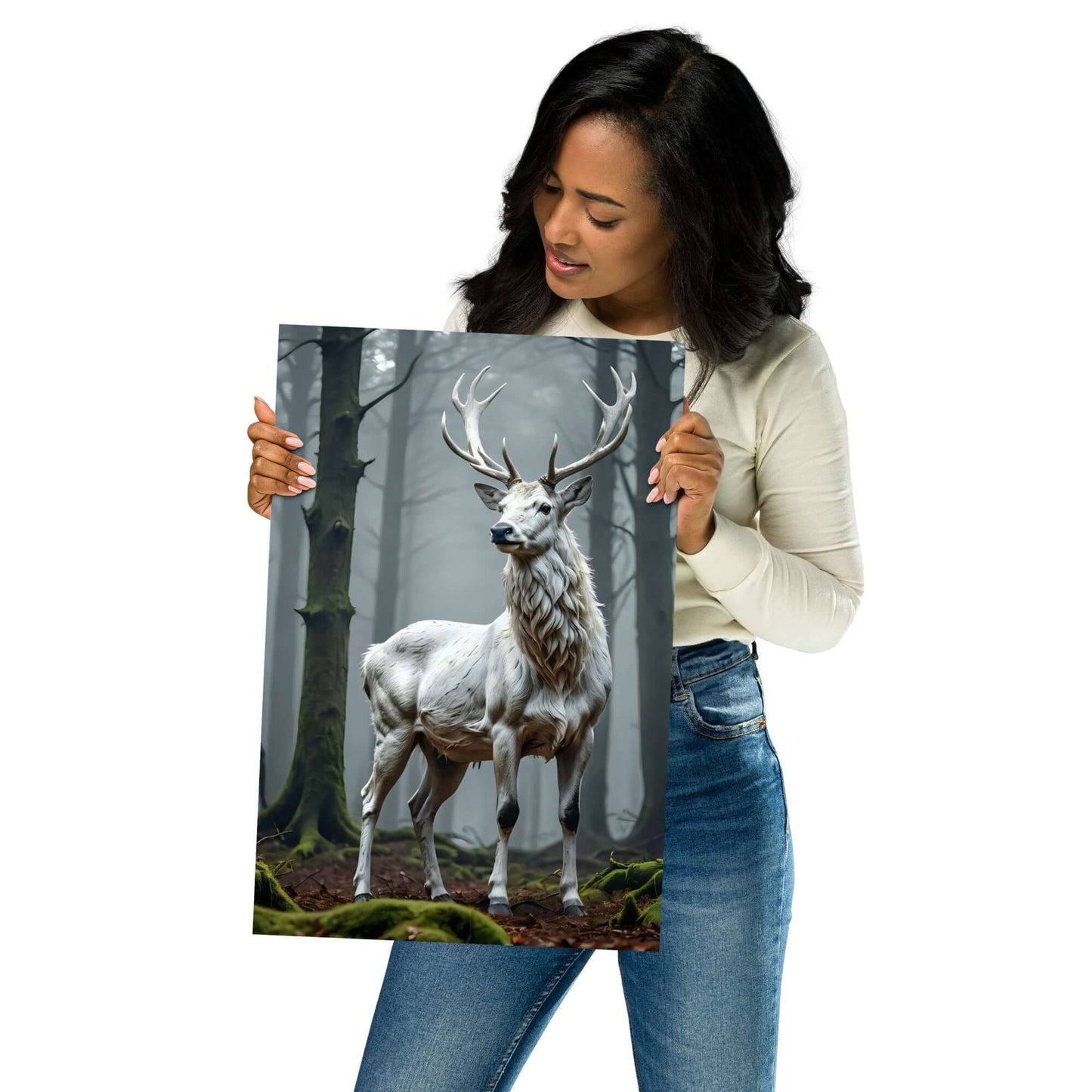 Woman holding a print of a deer in a forest
