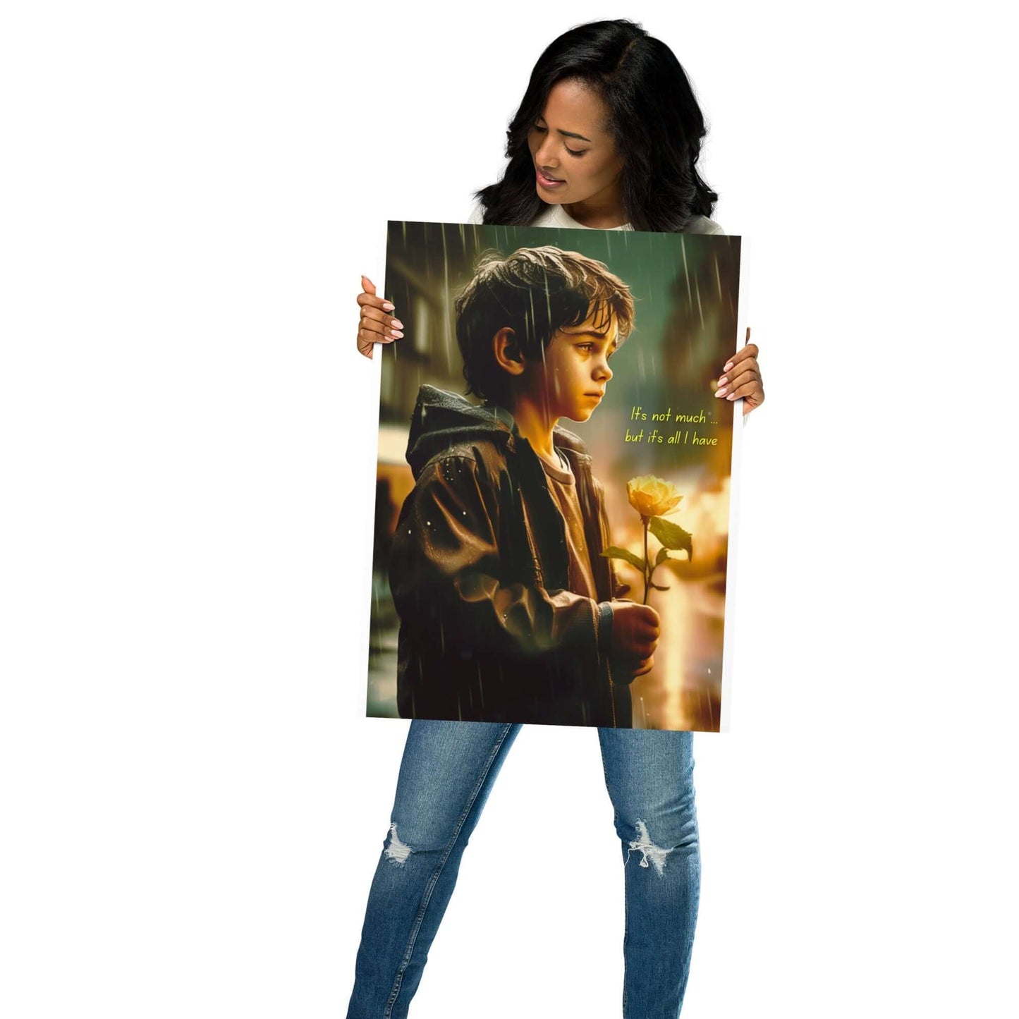 Person holding a poster of a young boy with a rose.
