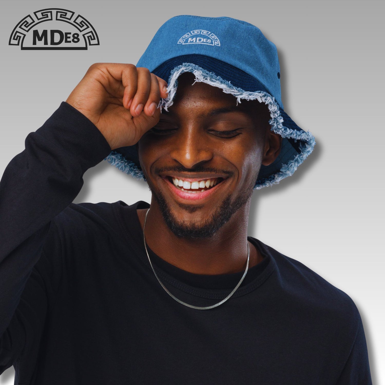 On-model distressed denim bucket hat — 3D puff embroidery by MDE8