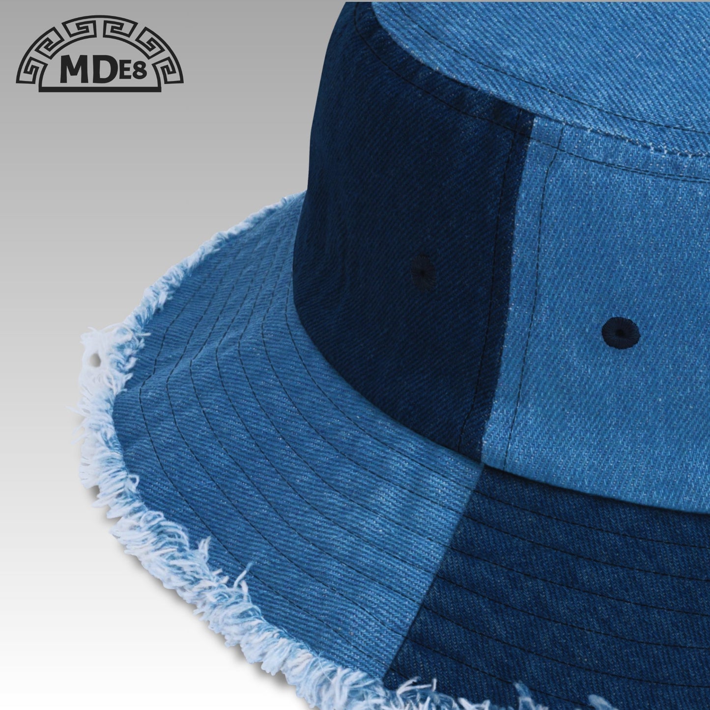 Distressed denim bucket hat — detail view premium embroidery MDE8