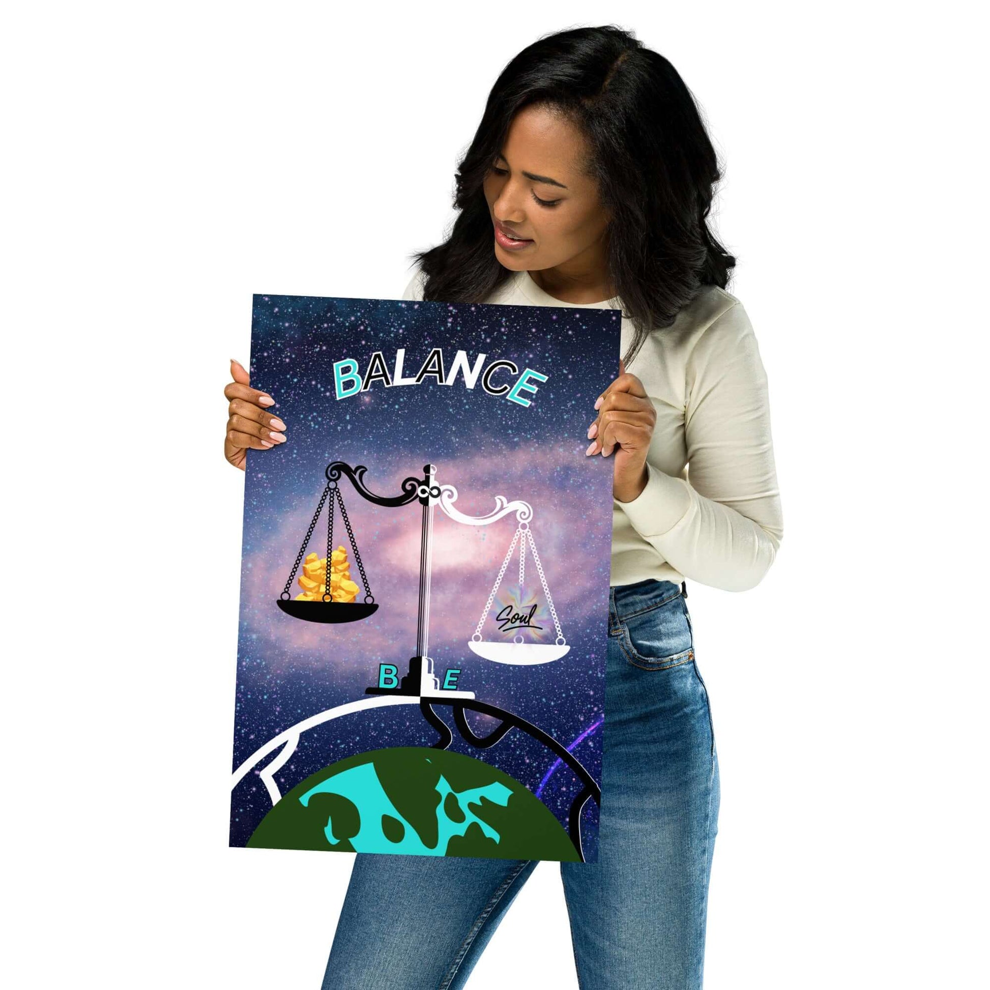 Person holding a poster with 'BALANCE' and astrological design